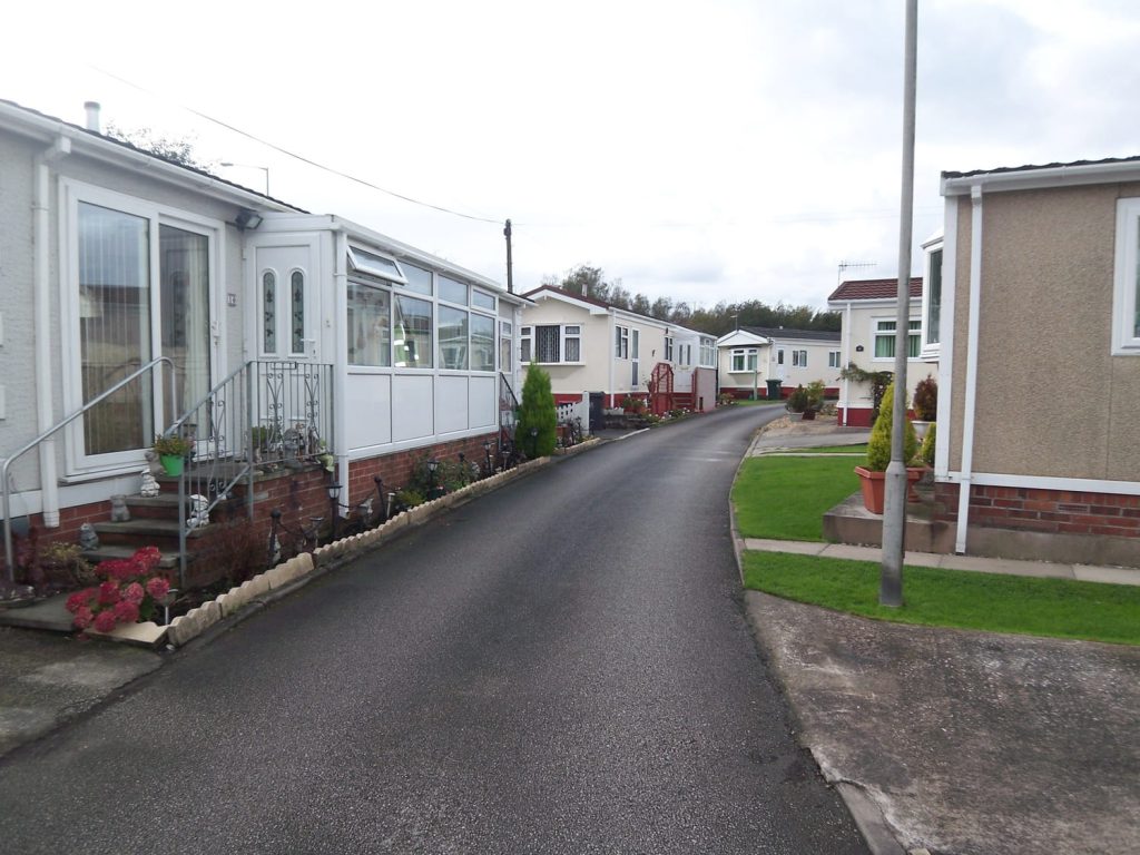 http://A%20line%20of%20lodges%20down%20a%20road%20in%20Bell%20Aire